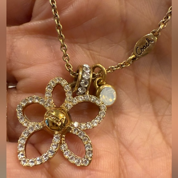 Coach Jewelry - COACh Gold Flower Pendant Necklace with pave crystals and small opal charm